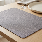 Grey table mat close-up on an aesthetic dining table