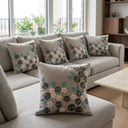 Blue Teal floral cushion set of five on a greige sectional, angled view