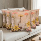 Beige floral cushion set of five on an ivory living-room sofa, front view