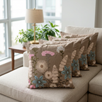 Brown floral cushion set of five on a sectional sofa, angled living-room view